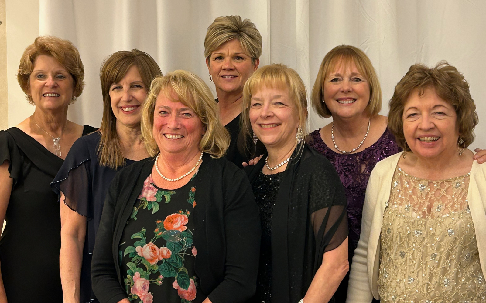 Group of women gathered for a photo.